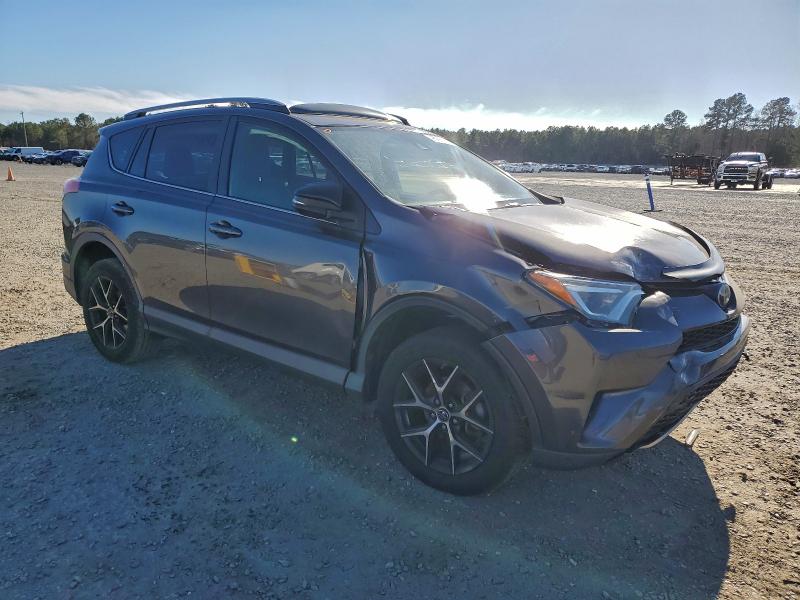 Photo 4 from auction – 2018 TOYOTA RAV4 SE with VIN JTMNFREV4JJ730048