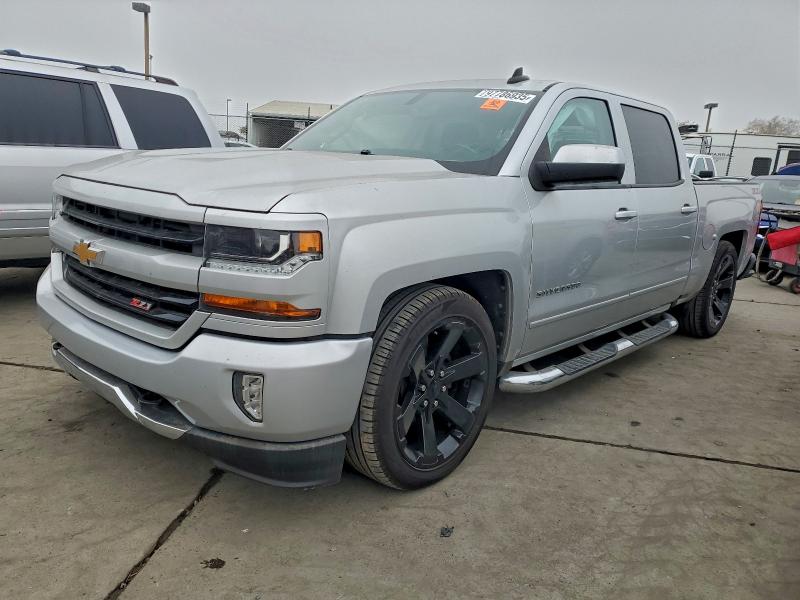 CHEVROLET SILVERADO 2018 with VIN 3GCUKREC3JG194149 - Photo from auction