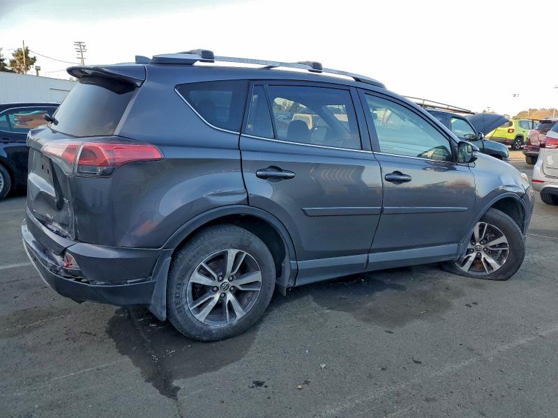 Photo 3 from auction – 2016 TOYOTA RAV4 XLE with VIN JTMWFREV4GJ100205