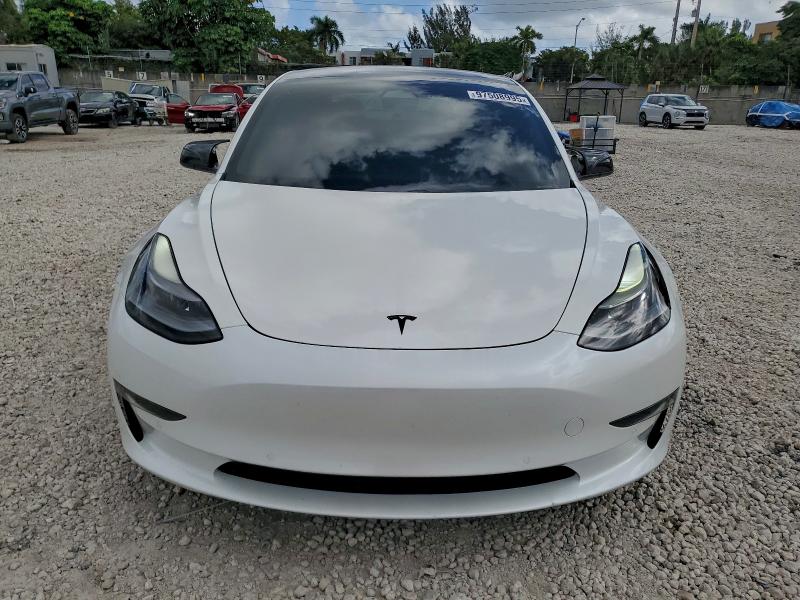 Photo 5 from auction – 2021 TESLA MODEL 3 with VIN 5YJ3E1EA5MF920249