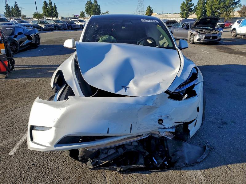 Photo 5 from auction – 2023 TESLA MODEL Y with VIN 7SAYGDEE3PA032060