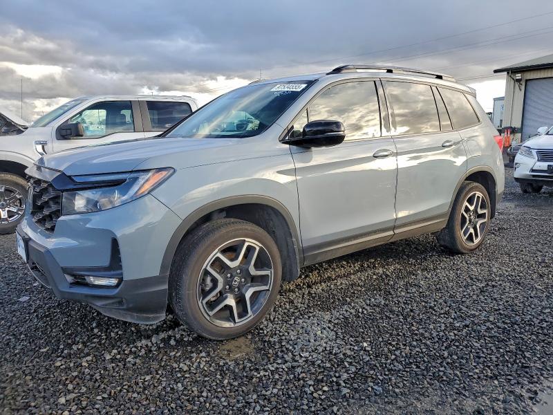 HONDA PASSPORT E 2023 with VIN 5FNYF8H04PB015570 - Photo from auction