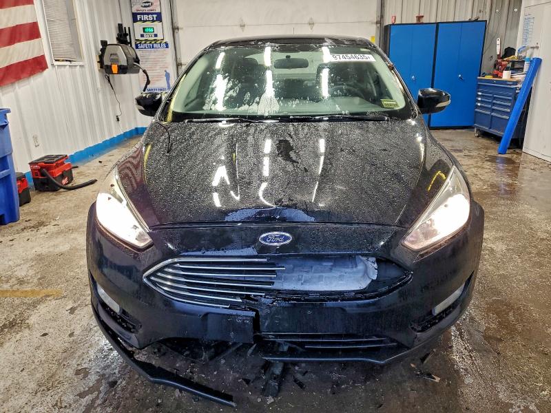 Photo 5 from auction – 2016 FORD FOCUS with VIN 1FADP3F28GL396619