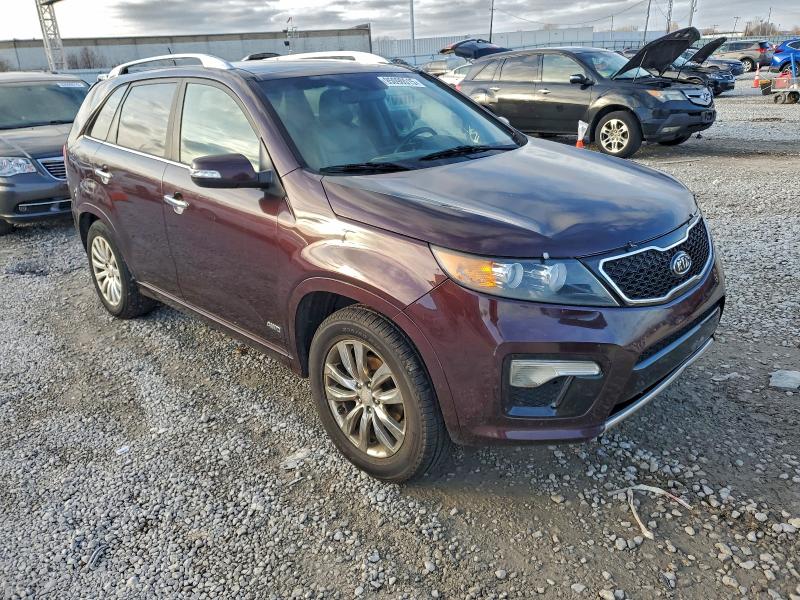 Photo 4 from auction – 2011 KIA SORENTO SX with VIN 5XYKWDA2XBG099132
