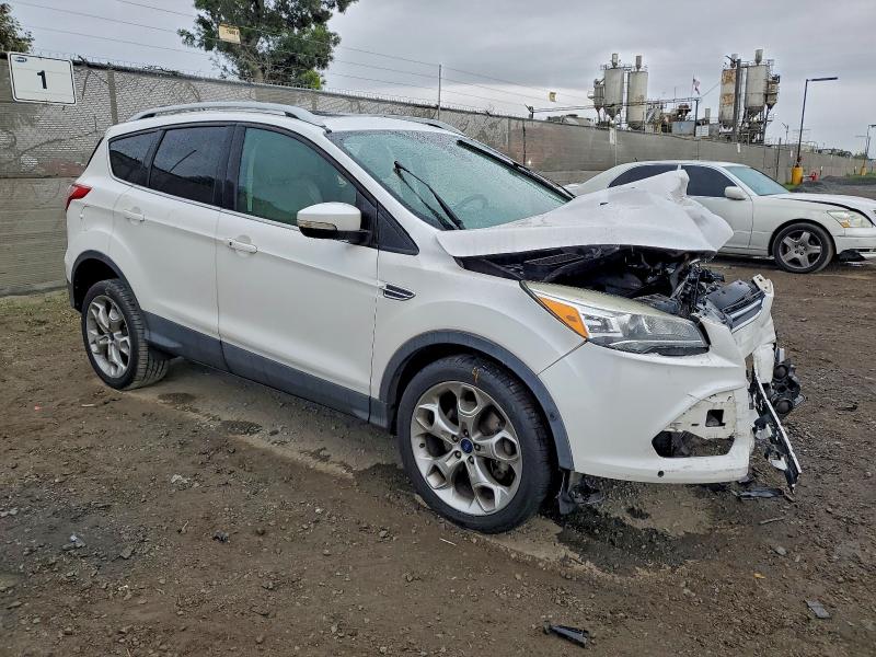 Photo 4 from auction – 2015 FORD ESCAPE TIT with VIN 1FMCU0J98FUA79252