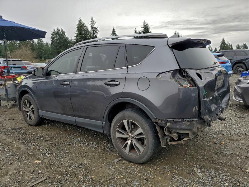 Photo 2 from auction – 2017 TOYOTA RAV4 XLE with VIN JTMRFREVXHD198573