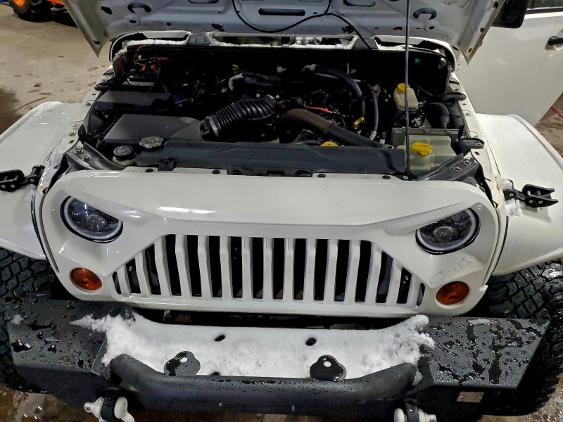 Photo 12 from auction – 2010 JEEP WRANGLER U with VIN 1J4BA3H15AL102375