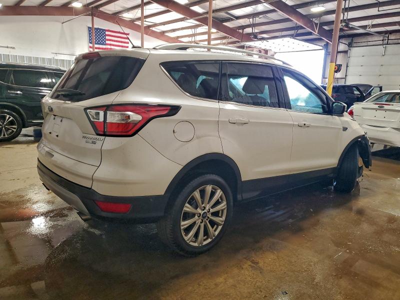 Photo 3 from auction – 2017 FORD ESCAPE TIT with VIN 1FMCU9J98HUE83207
