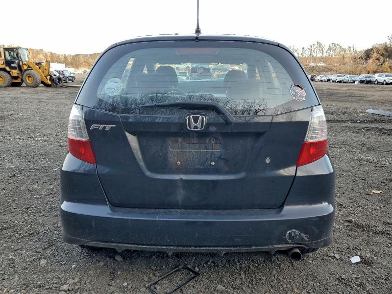 Photo 6 from auction – 2009 HONDA FIT with VIN JHMGE88279S025532