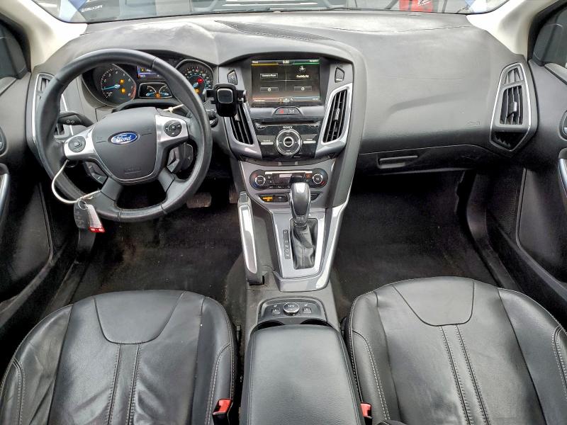 Photo 8 from auction – 2012 FORD FOCUS TITA with VIN 1FAHP3N22CL477886
