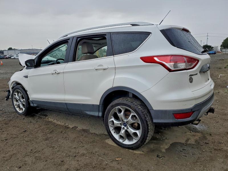 Photo 2 from auction – 2015 FORD ESCAPE TIT with VIN 1FMCU0J98FUA79252