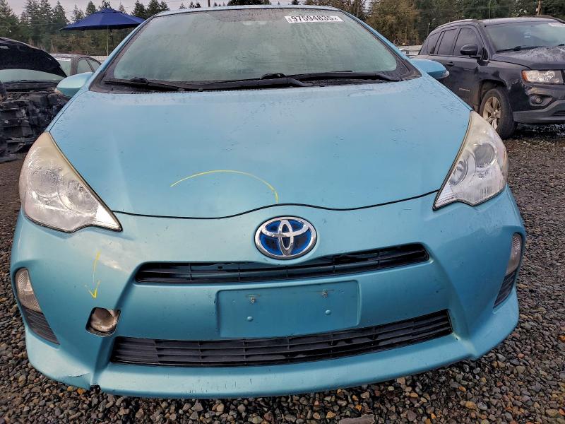 Photo 5 from auction – 2014 TOYOTA PRIUS C with VIN JTDKDTB3XE1073285