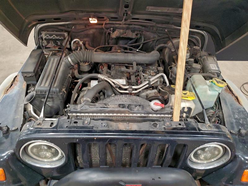 Photo 12 from auction – 2002 JEEP WRANGLER / TJ with VIN 1J4FA49S42P744904