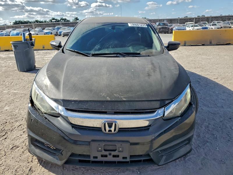 Photo 5 from auction – 2016 HONDA CIVIC LX with VIN 19XFC2F59GE223400