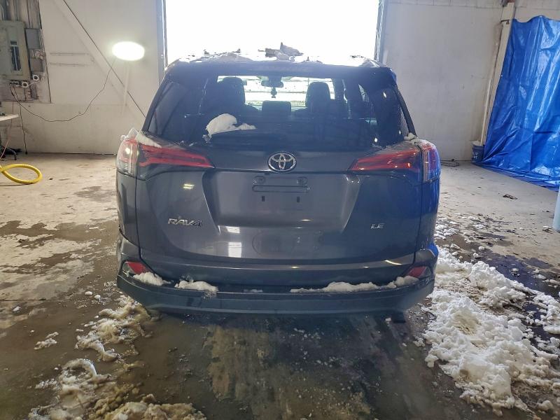 Photo 6 from auction – 2018 TOYOTA RAV4 LE with VIN 2T3ZFREV1JW444399