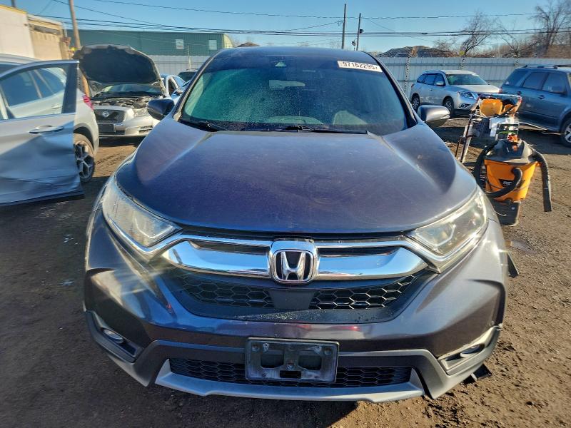Photo 5 from auction – 2017 HONDA CR-V EX with VIN 5J6RW2H55HL054013
