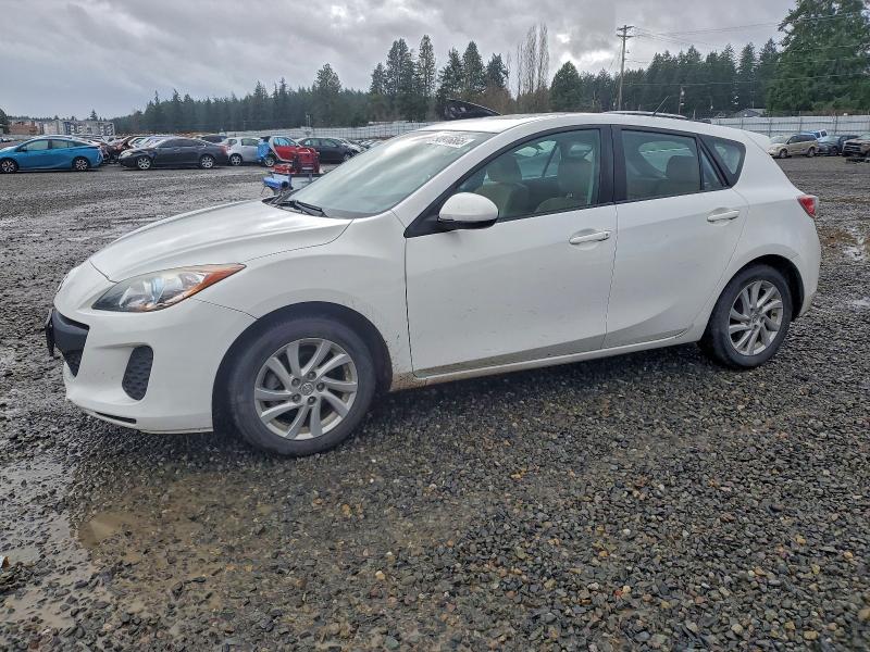 MAZDA 3 I 2012 with VIN JM1BL1L76C1557928 - Photo from auction