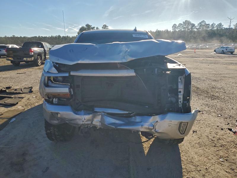 Photo 5 from auction – 2018 CHEVROLET SILVERADO with VIN 3GCUKREC1JG514620