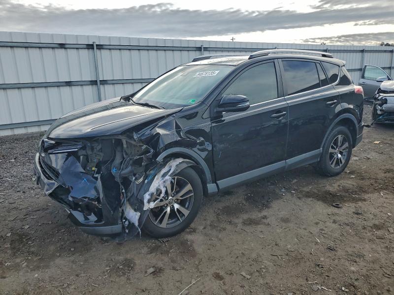 Photo 1 from auction – 2017 TOYOTA RAV4 XLE with VIN 2T3RFREV6HW644754