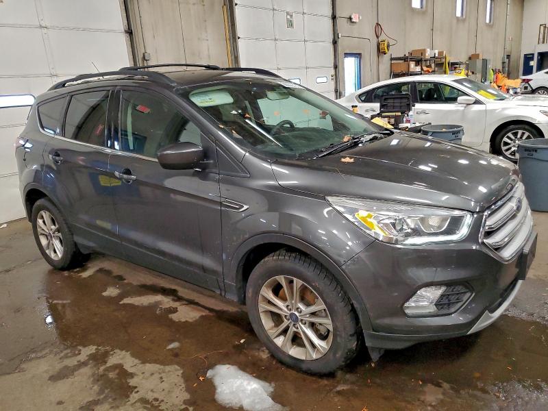Photo 4 from auction – 2017 FORD ESCAPE SE with VIN 1FMCU9G96HUA94492