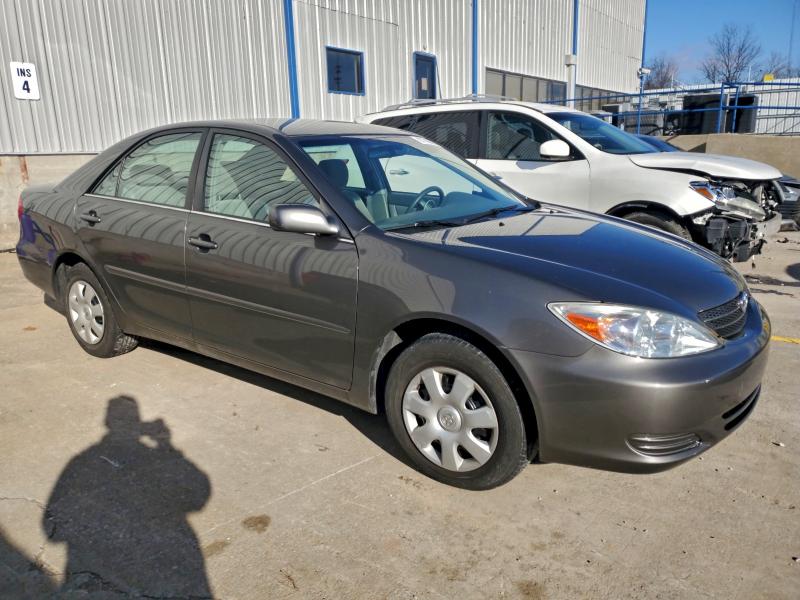 Photo 4 from auction – 2004 TOYOTA CAMRY LE with VIN 4T1BE32KX4U908511