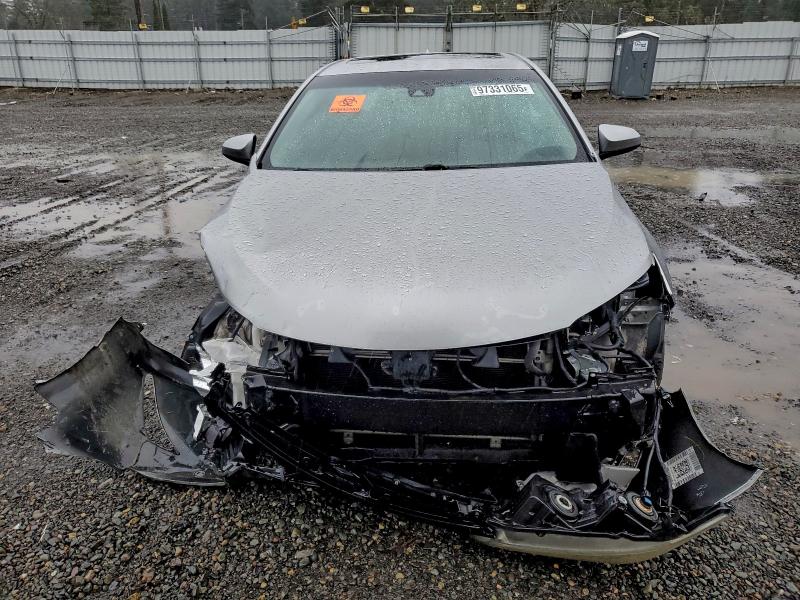 Photo 5 from auction – 2016 TOYOTA CAMRY HYBR with VIN 4T1BD1FK3GU196185