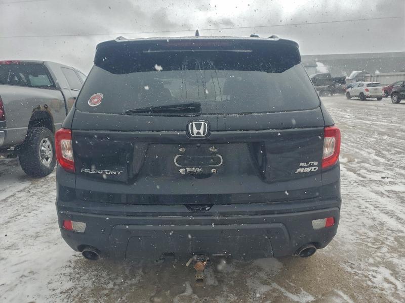 Photo 6 from auction – 2019 HONDA PASSPORT E with VIN 5FNYF8H03KB014628