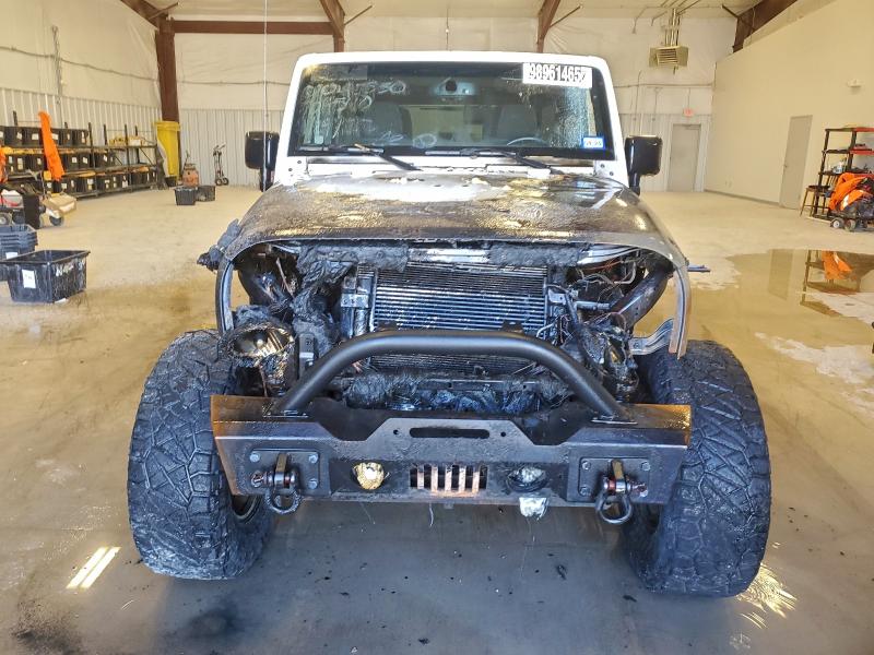 Photo 5 from auction – 2015 JEEP WRANGLER U with VIN 1C4BJWFG5FL704540