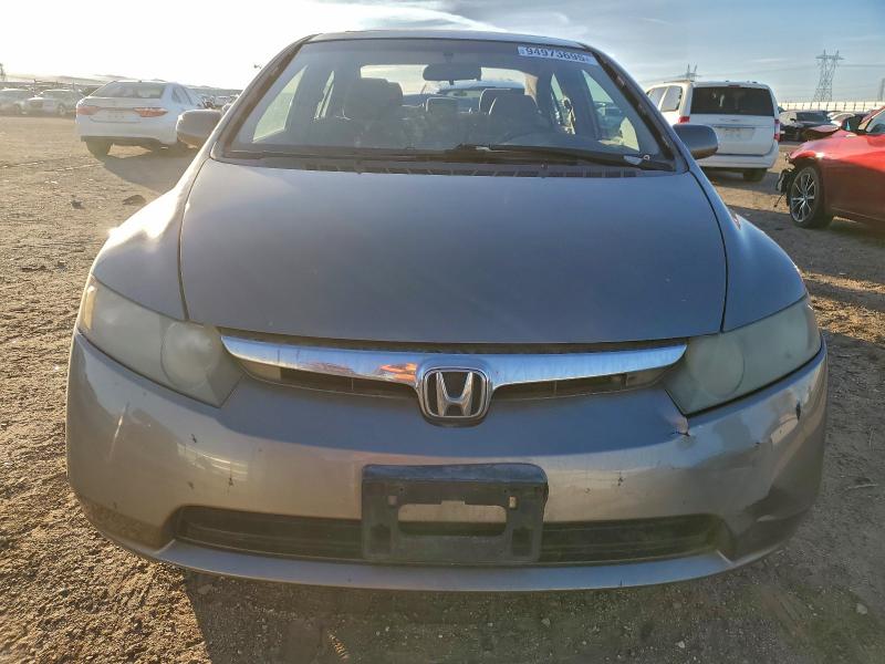 Photo 5 from auction – 2006 HONDA CIVIC EX with VIN JHMFA15806S008915