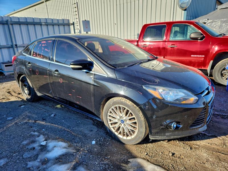 Photo 4 from auction – 2013 FORD FOCUS TITA with VIN 1FADP3J22DL376918