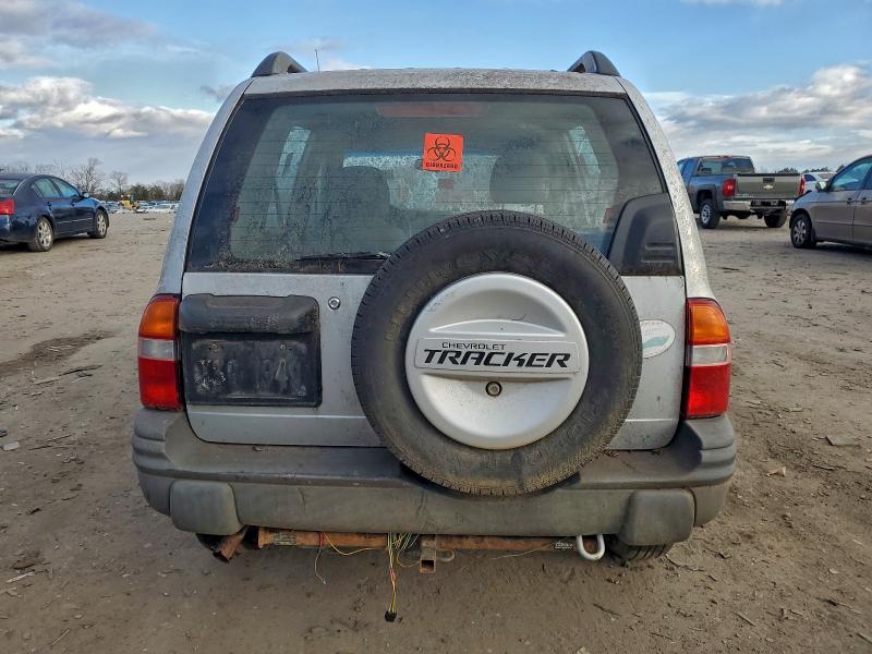 Photo 6 from auction – 2000 CHEVROLET TRACKER with VIN 2CNBJ13C7Y6907750