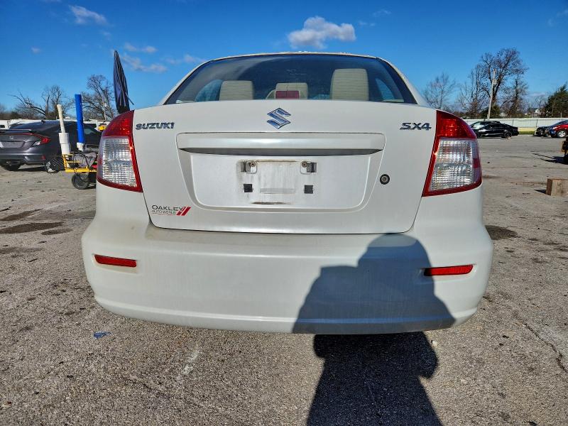 Фото 6 с аукциона – 2013 SUZUKI SX4 LE с VIN JS2YC5A36D6101293