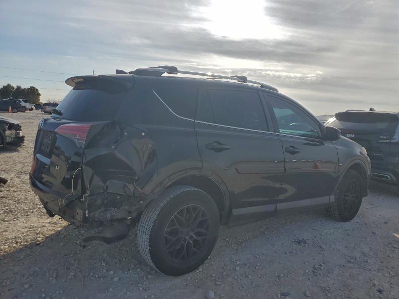 Photo 3 from auction – 2018 TOYOTA RAV4 LE with VIN 2T3ZFREV0JW498972