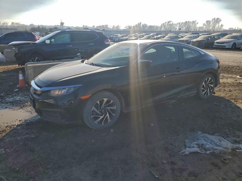 HONDA CIVIC LX 2018 with VIN 2HGFC4A57JH305786 - Photo from auction