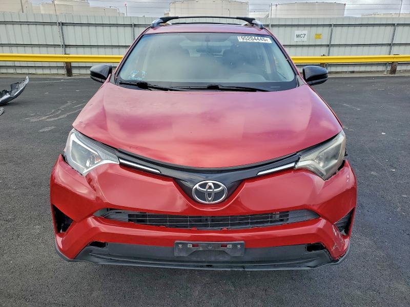 Photo 5 from auction – 2016 TOYOTA RAV4 LE with VIN JTMZFREV0GJ063005