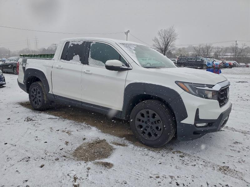 Photo 4 from auction – 2023 HONDA RIDGELINE with VIN 5FPYK3F58PB055686