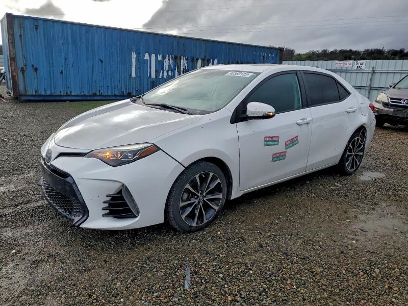 TOYOTA COROLLA L 2018 with VIN 5YFBURHE8JP743773 - Photo from auction