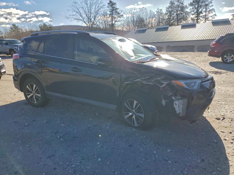 Photo 4 from auction – 2017 TOYOTA RAV4 XLE with VIN 2T3RFREV0HW545136