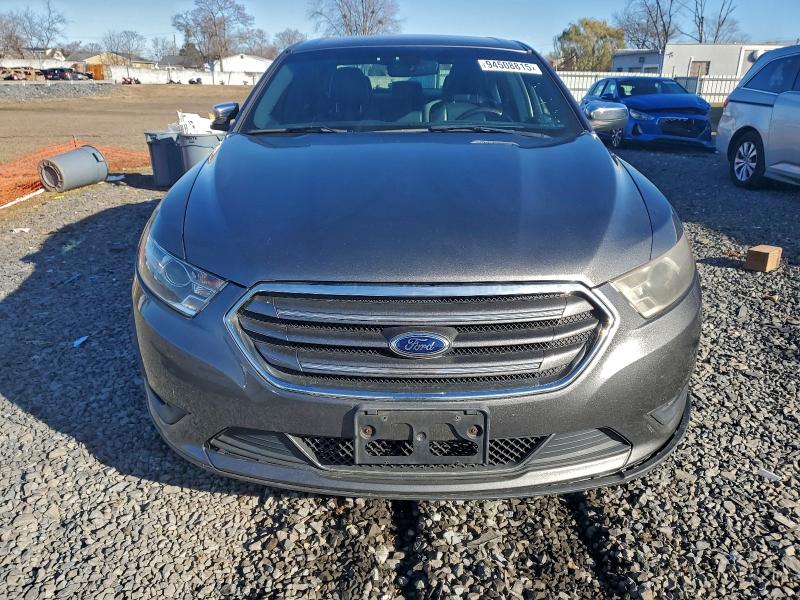 Photo 5 from auction – 2014 FORD TAURUS LIM with VIN 1FAHP2F84EG183026