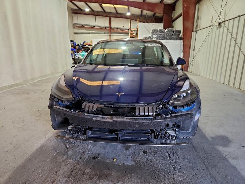 Photo 5 from auction – 2022 TESLA MODEL 3 with VIN 5YJ3E1EA3NF372267