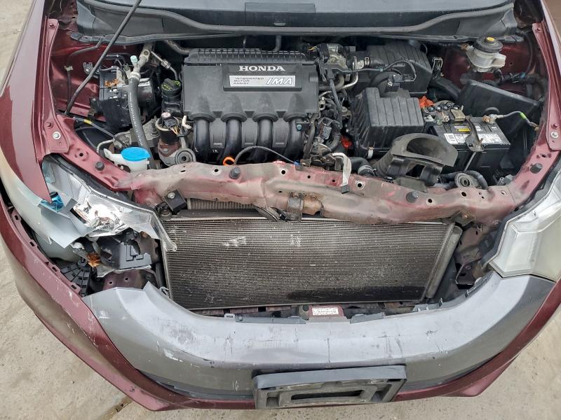 Photo 11 from auction – 2011 HONDA INSIGHT LX with VIN JHMZE2H51BS011163