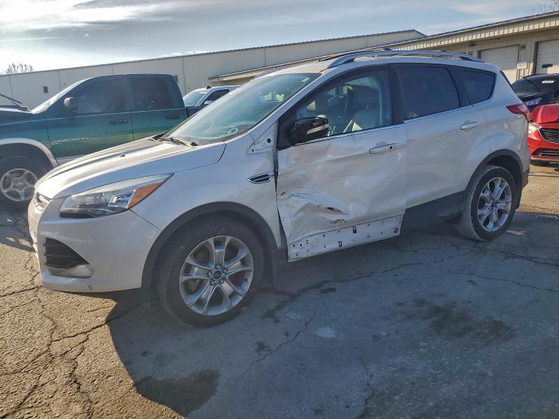 FORD ESCAPE TIT 2016 with VIN 1FMCU0J92GUA07125 - Photo from auction