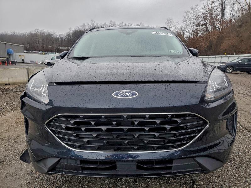 Photo 5 from auction – 2021 FORD ESCAPE SE with VIN 1FMCU9G65MUA48264