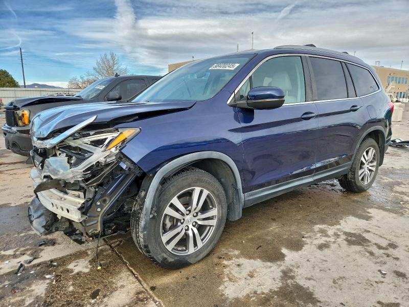 HONDA PILOT EXL 2016 with VIN 5FNYF6H55GB020762 - Photo from auction
