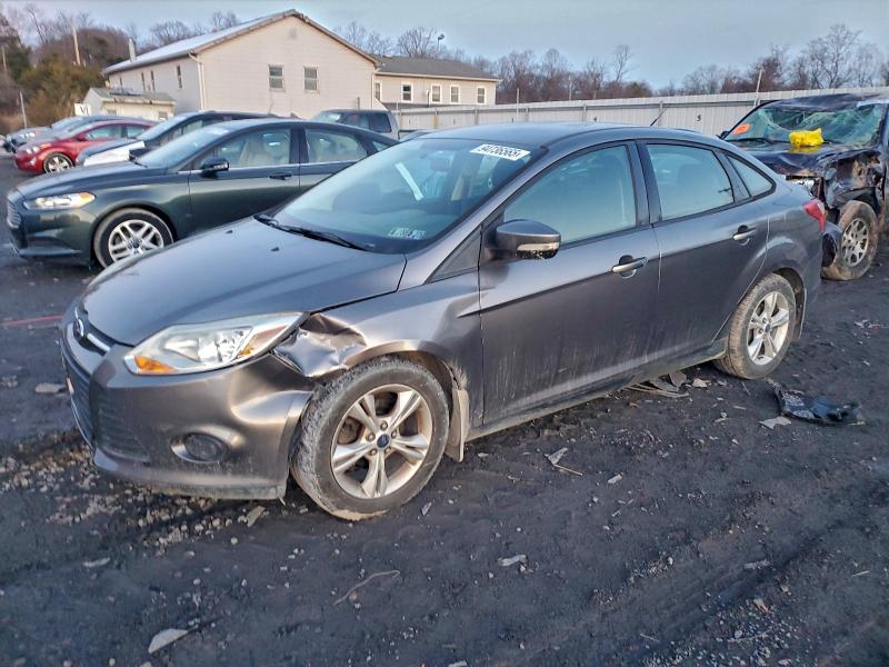 FORD FOCUS SE 2014 with VIN 1FADP3F23EL457369 - Photo from auction