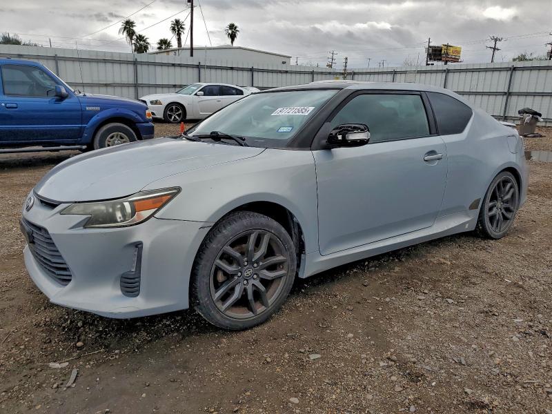 TOYOTA SCION TC 2014 with VIN JTKJF5C79E3068854 - Photo from auction