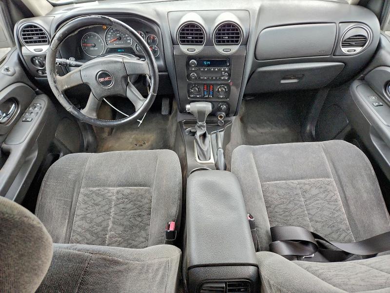 Photo 8 from auction – 2006 GMC ENVOY with VIN 1GKDS13S162212275