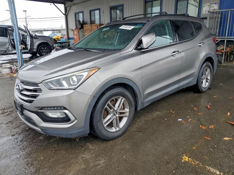 HYUNDAI SANTA FE S 2017 with VIN 5NMZU3LB0HH016589 - Photo from auction
