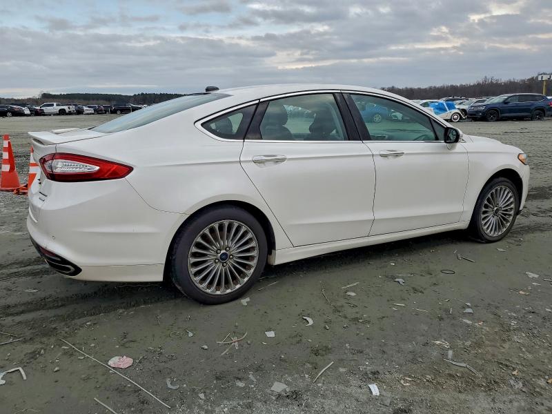 Photo 3 from auction – 2016 FORD FUSION TIT with VIN 3FA6P0K98GR287590