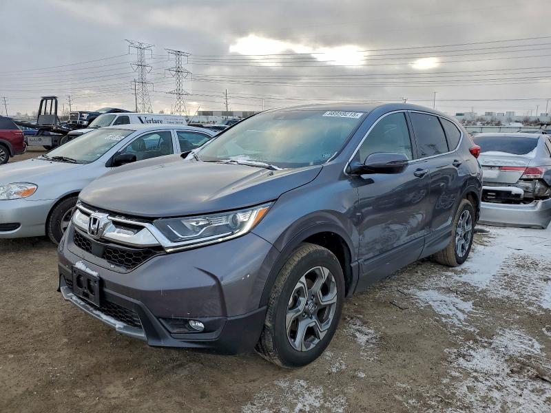 HONDA CR-V EX 2017 with VIN 2HKRW2H58HH688085 - Photo from auction
